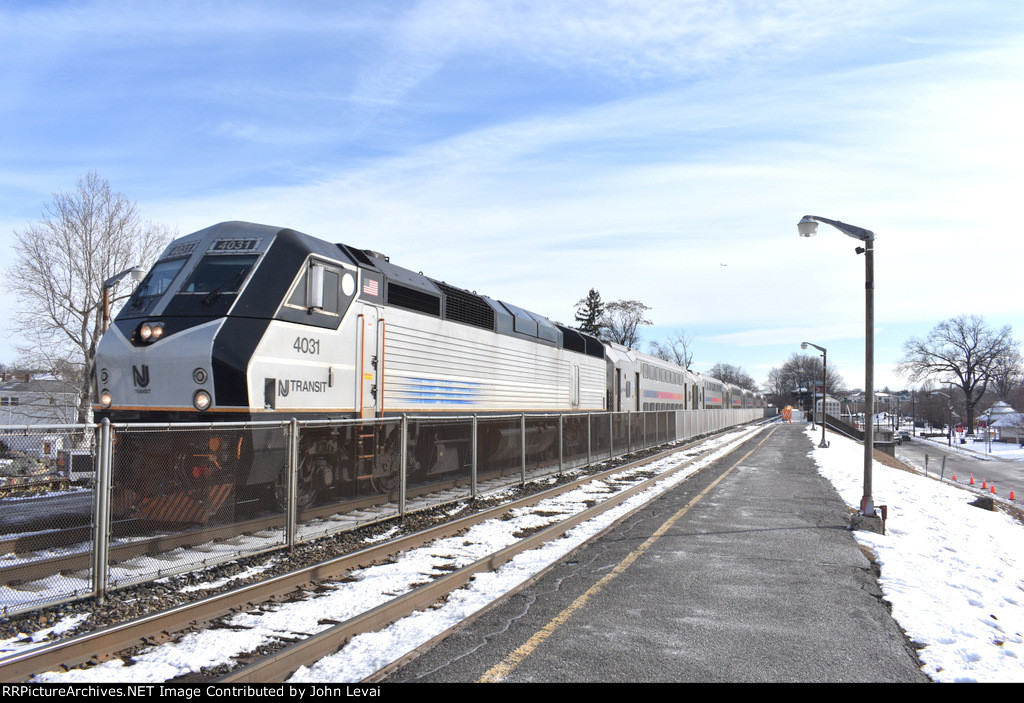 Westbound NJT Multilevel Consist about to stop at Lyndhurst Station behind a PL42AC